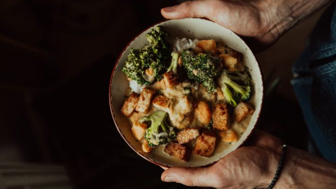 A close-up of a healthy tofu and broccoli bowl, ideal for vegetarian diets and wholesome meals.